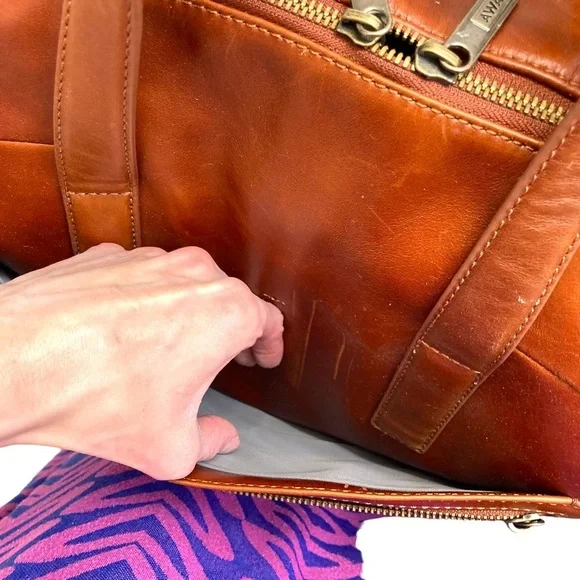 Always limited edition brown leather duffle bag unisex